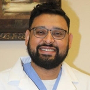 Dr. Ketan Patel working at Peppermint Dental & Orthodontics